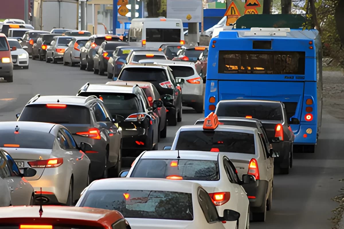 Traffic congestion with cars and buses on city street