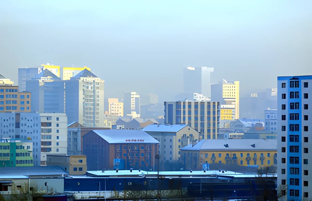 Winter city skyline in Ulaanbaatar shrouded in smog.
