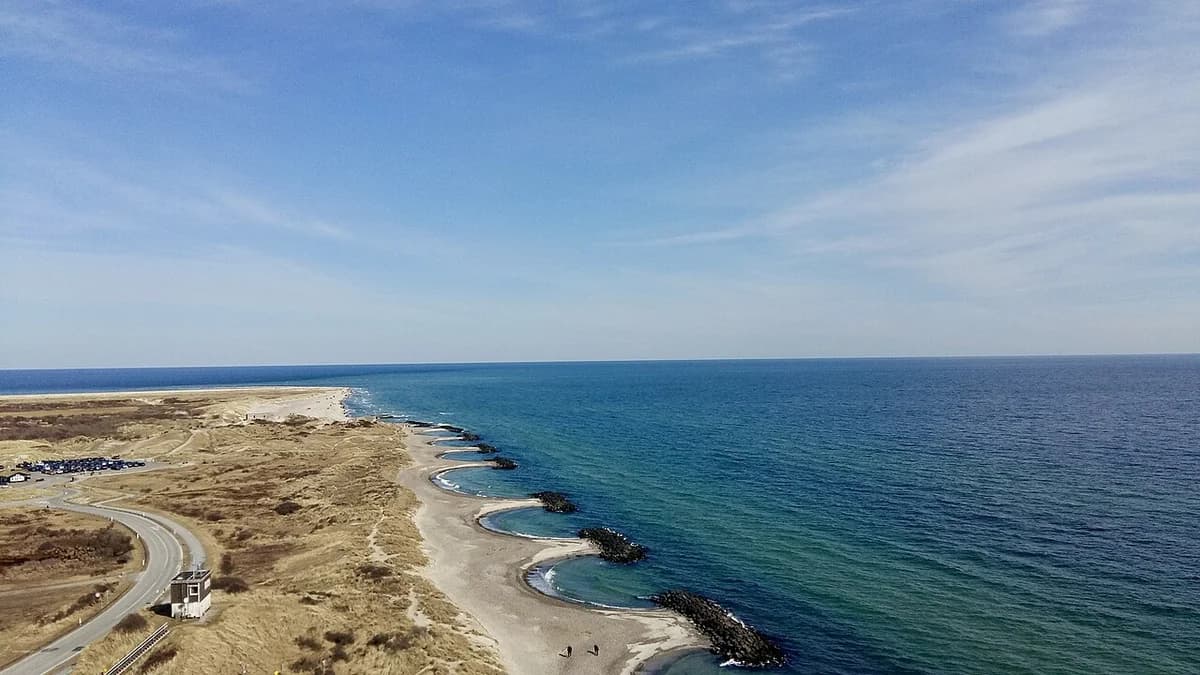 aerial view of coastal breakwaters and shoreline
